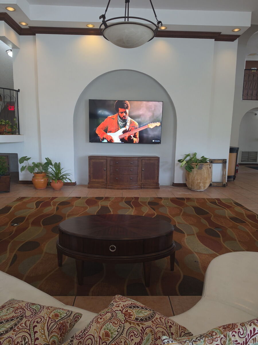 Lobby lounge with TV at The Vue Lake Tarpon